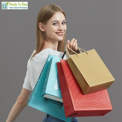 China Recycled Materials Boutique Red Custom Gold Foil Stamping Logo Shopping Paper Bag Luxury Gift Jewelry Paper Bag With Three-Ply Rope for sale