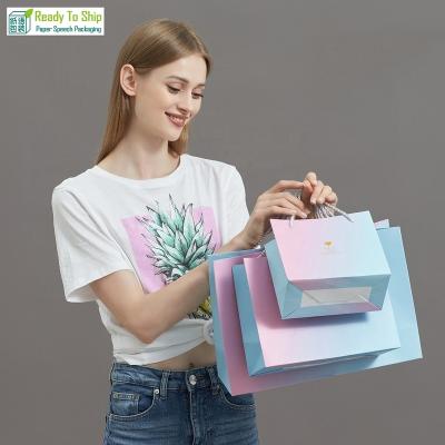 China Handmade custom popular pantone color printing bolsas bolsas wedding favor wedding favor door gift wrap flower paper bag with free logo for sale