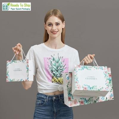 China Handmade Custom Luxury Apparel Custom Luxury Apparel Gift Boutique T-shirt Gift Boutique Satin Handle Logo Packaging Paper Shopping Bags for sale