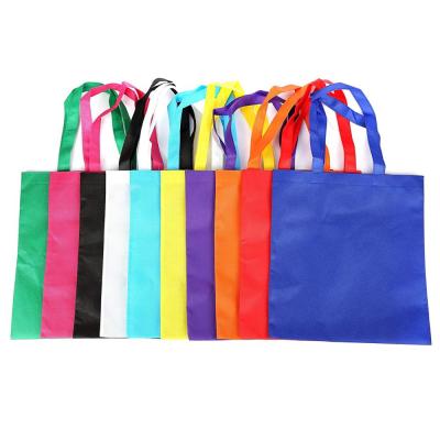 China Eco-friendly party gift packaging, material, various colorful empty canvas bags, rainbow ribbon handle for birthday gifts for sale