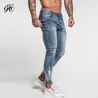 China Sustainable Hot Sale Painted New Design High Quality Stretch Cotton Blue Jeans Distressed Skinny Jeans for sale