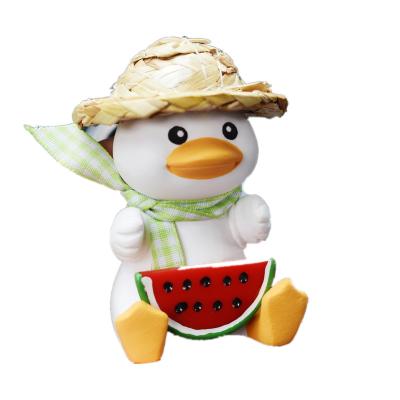 China Decorate most popular patterned clothes lean outlet ornament eating watermelon duck ornament for sale