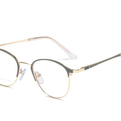 China Fashion Modern Women Vintage Clear Glass Metal Frame Optical Glass Female Transparent Eye Frames for sale