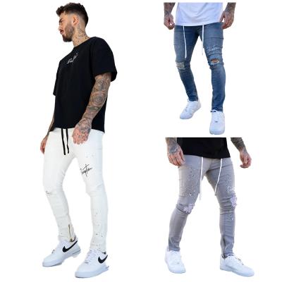 China New European and American cowboy men's pants breathable wholesale hole breaking trend slim fit men's denim pants gaiters for sale