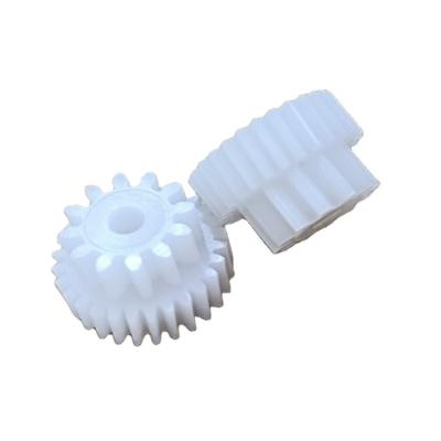 China Huayida Custom POM High Precision Plastic Helical Gear Massager Plastic Injection M0.2-1.0 Helical Gear for sale