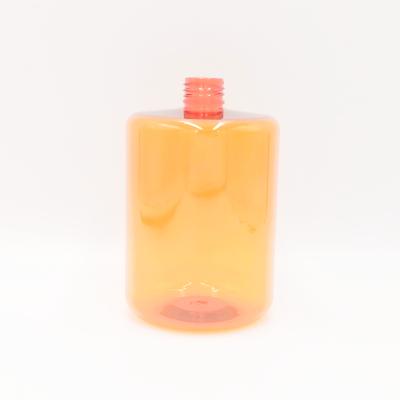 China Custom Empty Transparent Orange Plastic Shampoo Bottle PET Color 600ML Round Foam Pump Bottles Cosmetic Round Bottles for sale