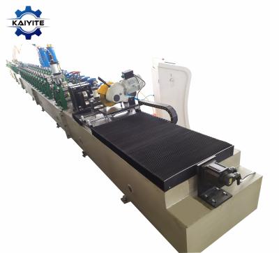 China Building Material Shops Equipment Automatic Sandwich PU Foam Board Shutter Door Forming Machine For Panel Making for sale