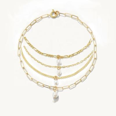 China TRENDY LOZRUNVE 925 Sterling Silver Gold Plated Freshwater Pearl Dangling Thin Curb Figaro Chain Bracelet for Women for sale