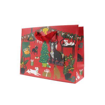 China 2022 Recycled Materials New Arrival Christmas Gift Bags 250gsm C1S Custom Paper Christmas Bag Large Gift Pack for sale