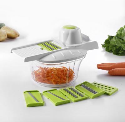 China Sustainable Vegetable Handle Slicer Vegetable Kitchen Instruments With Container for sale