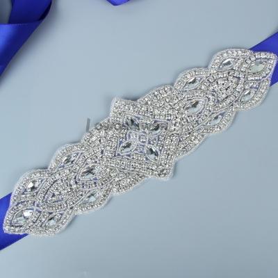 China Bridal Sash Luxury Crystal Rhinestone Wedding Design Luxury Pearl Beads Dress Sash for sale