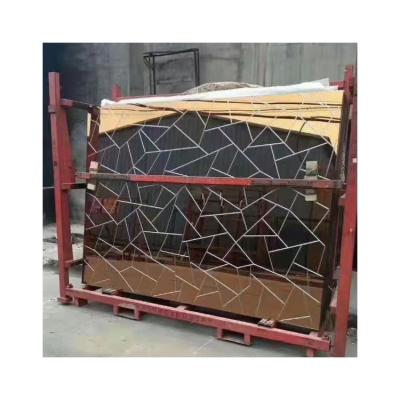 China Easy Installation Form V Groove Decorative Thatched Toughened Glass Mirror Sheets For High End Decoration for sale