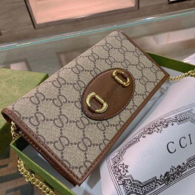 China 2022 New Waterproof Pu Pebble Leather Flat Logo Pocket Wrist Purse Bag Waterproof Custom Embossed Clutch Bag Chain Lady Bags for sale