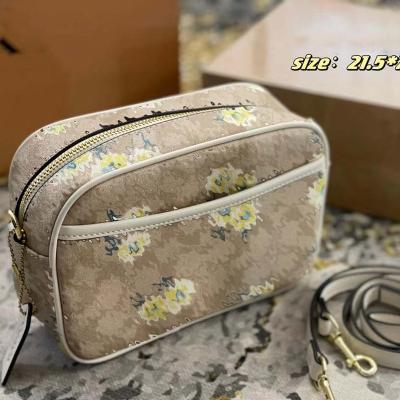 China 2022 Latest Fashion Designer Daisy Print Collection Camera Bag PU Leather One Shoulder Ladies Messenger Bag for sale