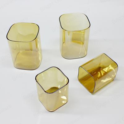 China New Home Decoration Style Square Shape Light Amber High Borosilicate Glass Candle Holder Amber Glass Jars Candle Holder for sale