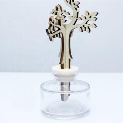 China Gift 100ml Perfume Glass Bottle With Hat And Christmas Tree Diffuser Bottle for sale