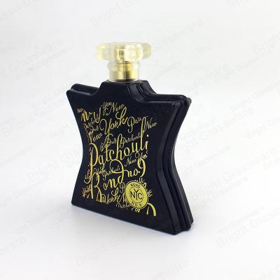 China Personal Care Classic Glass Perfume Bottle Star Shape Glass Black Base Perfume Bottle With Square Cap for sale