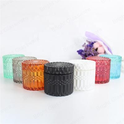 China Sustainable Wholesale Colored Glass Candy Jar Storage Glass Jar With Flat Lid for sale