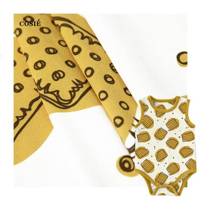 China Viable Factory Digital Printed Custom Yellow Cartoon Pattern Crispy Cookies On Jersey Bamboo Fabric Soft Knitted Fiber Fabric For Kid for sale