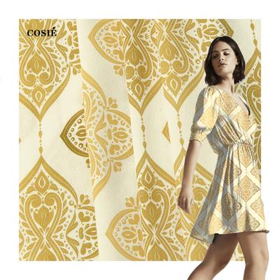 China Viable Custom Soft Georgette Fabric Digital Printed Fabric Gold Print Retro Ply Fabric And White Floral Pattern Rayon For Dress for sale