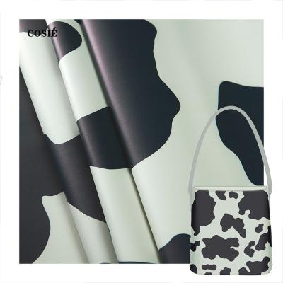 China Waterproof High Quality Digital Printing Vinyl Fabric Leather Cow Spots Pattern No Moq Waterproof Leather Fabric For Custom Printing Bags for sale