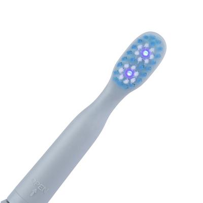 China Rechargeable Rechargeable Led Blue Light Whitening UVC+UVA Teeth Light Electric Toothbrush for sale