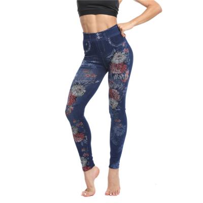 China Breathable Women's Slim Leggings Imitated Jeans Fitness Pants Ladies Lift Hips Printed Jeggings for sale