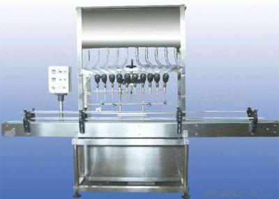 China 100-1000ml empaquetadora líquida, Juice Automatic Jar Filling Machine en venta