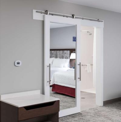 China Hampton Inn Hotel Bathroom &Closet Windproof White Painted Interior Standing MDF Panel Sliding Mirror Wood Barn Door for sale