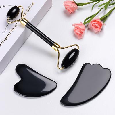 China New ideashandheld double rollers natural black obsidian jade roller gua sha skin care tools set for body car for sale