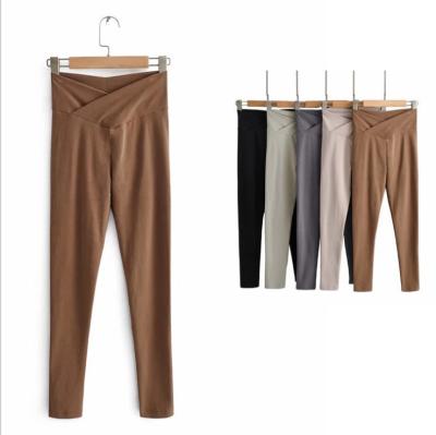 China Urban casual fashion women soft waist hip pants plus size pants fall slim stretch solid color leggings for sale