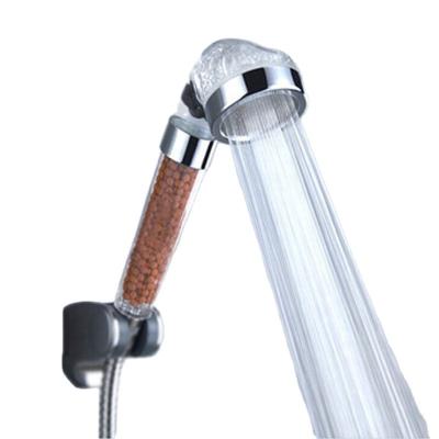 China Without Needle Filter Water Saving Mineral Stone Shower Head for sale