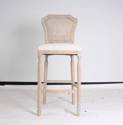 China Wholesale event odd country style bar stool chair rattan back antique bar stools wooden carved with linen fabric barstoo for sale