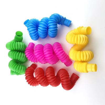 China 2021 Hot Sale Busty Person Funny Educational Colorful Pipe Toys Magic Colorful Noises Tubes For Stress And Worry Relief for sale