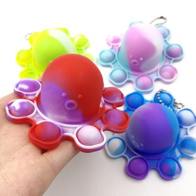 China Cute Funny Trigger Key Chained Person Buttons Key Chain Toy Popping Fidget Toy Bubble Push It Silicone Restless Person Sensory Toy for sale