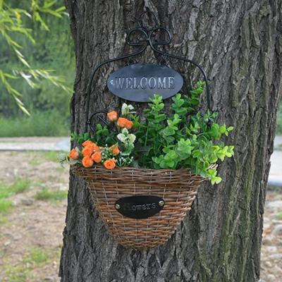 China Countryside Willow Basket Waterproof Wicker Wall Hanging Flower Pots For Sale for sale