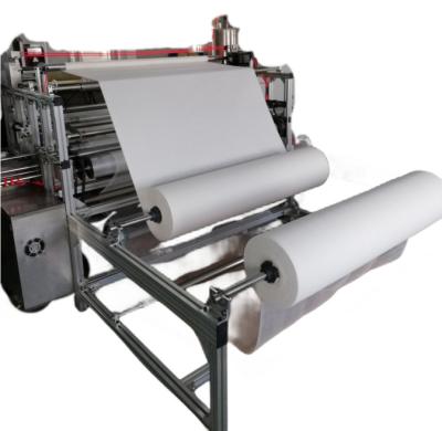 China Full Automatic Textile Industry Gauze Bandage Rolling Machine for sale