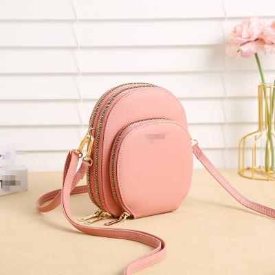 China Fashion Hot Sale Wholesale PU Mini Leather Multifunctional Women's Mobile Phone Bags for sale