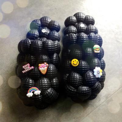 China Fashion Trend Wholesale Cheap Pins Smile Yellow EVA Slippers Custom Charms Comfort Sandals Massage Bubble Slides Slippers With Charms Men for sale