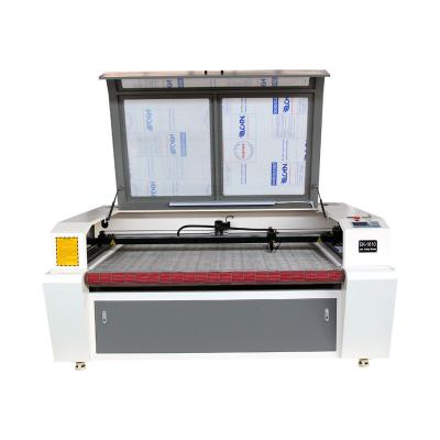 China 1610 Laser CUT Textile Fabric Laser Cutter Machine Leather Laser Cutting Machine With Auto Feeding for sale