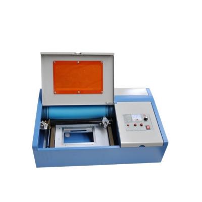 China mini laser engraving rubber stamps acrylic laser engraving cutting machine for sale for sale