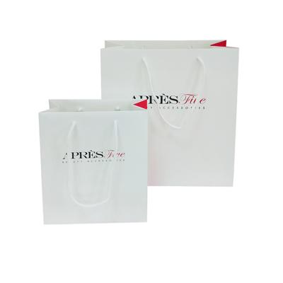 China Recyclable Custom Luxury Printed Shopping Paper Bag With Rope Handles for sale