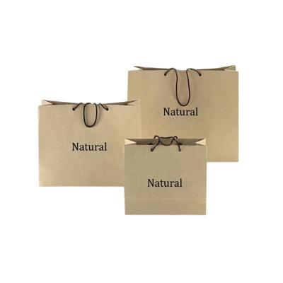 China Recyclable Craft Paper Material And Industrial Use Kraft Shopping Bag With Handles for sale