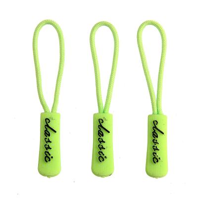 China Custom Logo PVC Nickel Free Zipper Pullers Rubber Zipper Slider For Clothing for sale