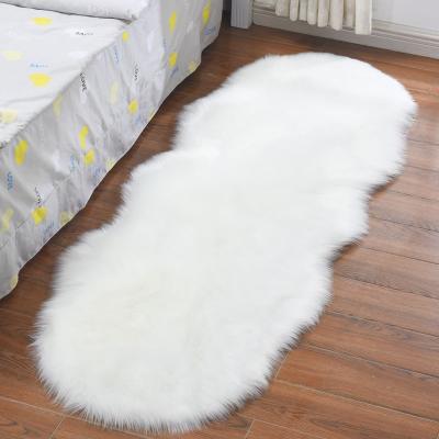 China Custom white sheepskin fur custom curve shape bedroom living room cushioned faux sfot blanket rug for sale