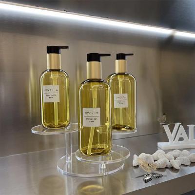 China Cosmetic Gold Translucent Lotion Bottle , Alumina Press Emulsion Pump PET Plastic Empty Lotion Bottle for sale