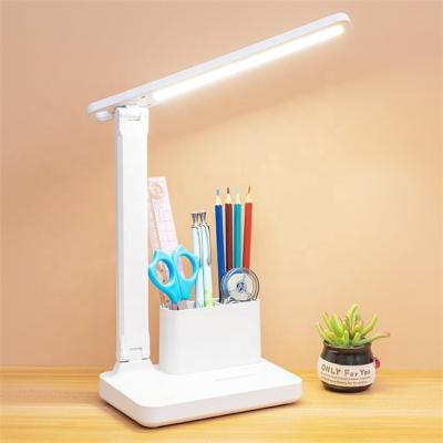 China Creative modern modern eye protection folding desk lamp office reading led study table lamp with pen holder for sale