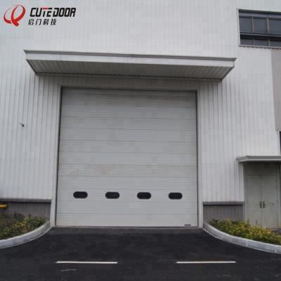 China Automatic Motorized Industrial Aluminum Warehouse Overhead Sectional Garage Door for sale