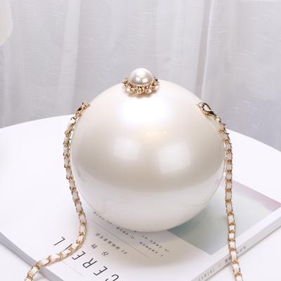 China Handheld Makeup Women's Fashion Pearl Bag Box Earth Bias Bag Acrylic Hard Jelly Bags for sale