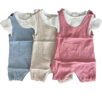 China Casual cute style cotton baby romper set unisex solid color baby romper brave man casual romper baby for sale